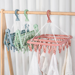 Multifunctional, Foldable and Space-Saving Laundry Hanger (32 pegs) | Plastic and Rotating Hanging Drying Rack